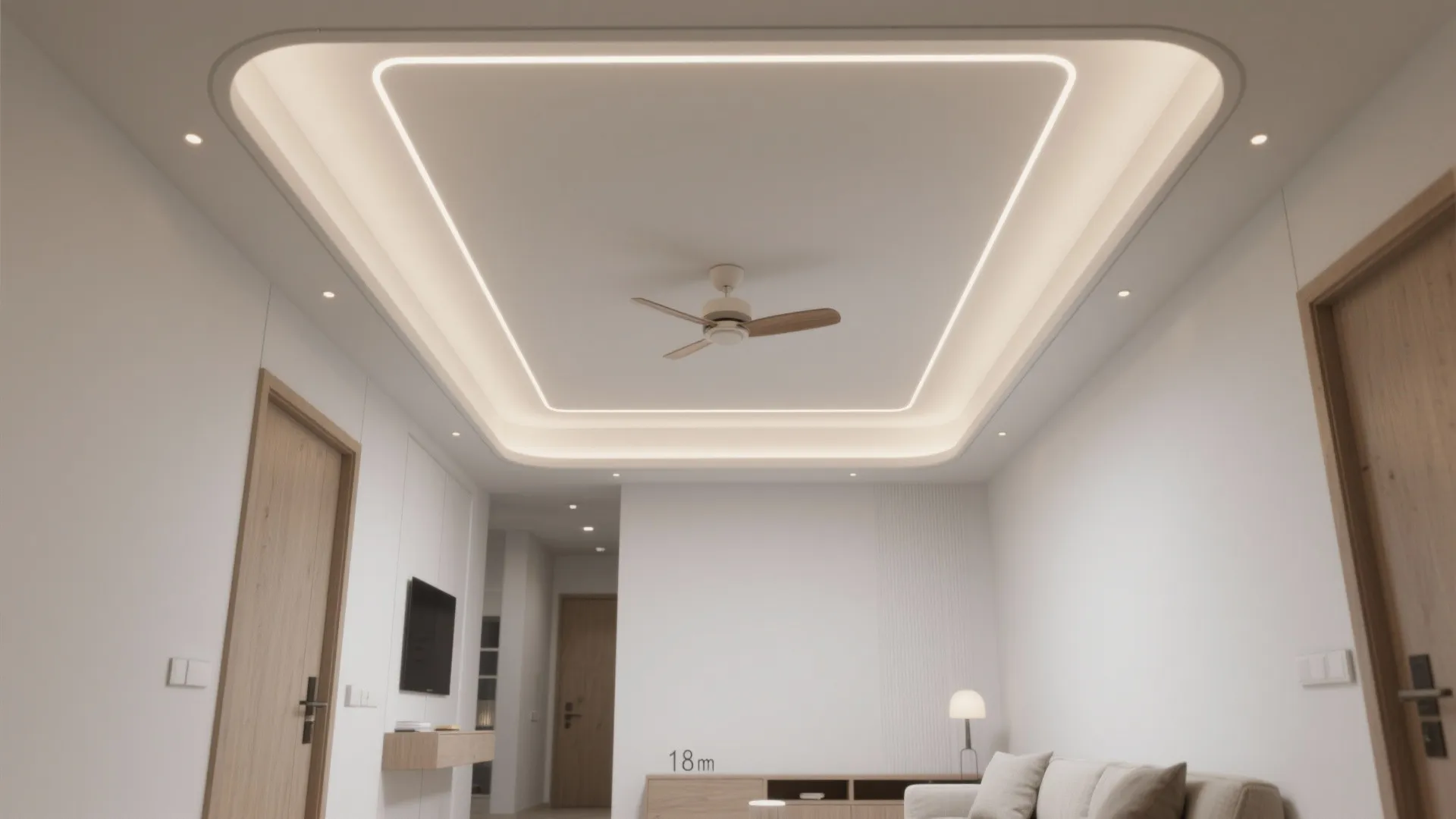 Modern white living room featuring a recessed ceiling with glowing light strips and ceiling fan