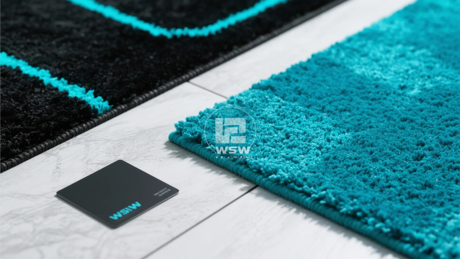 Close up view of black and bright blue rugs placed on white wooden floor design