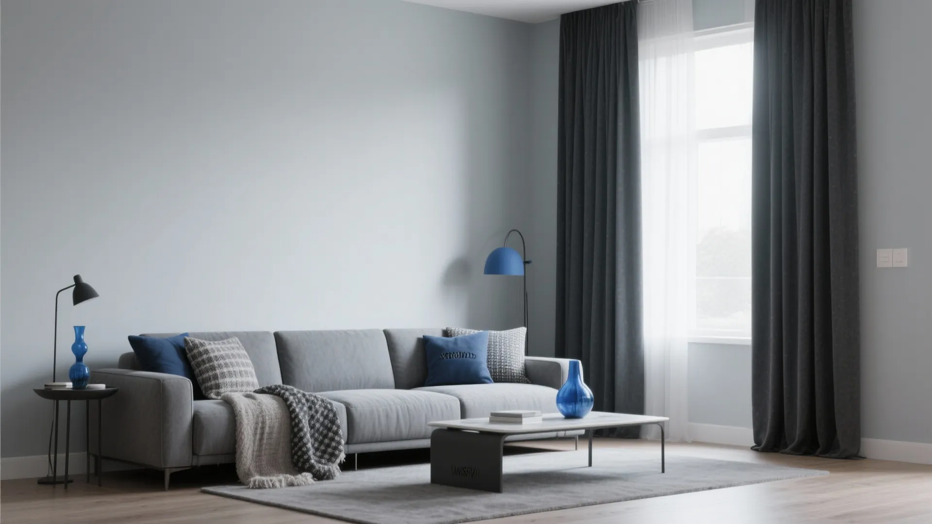 Layered shades of grey with blue accents in a living room