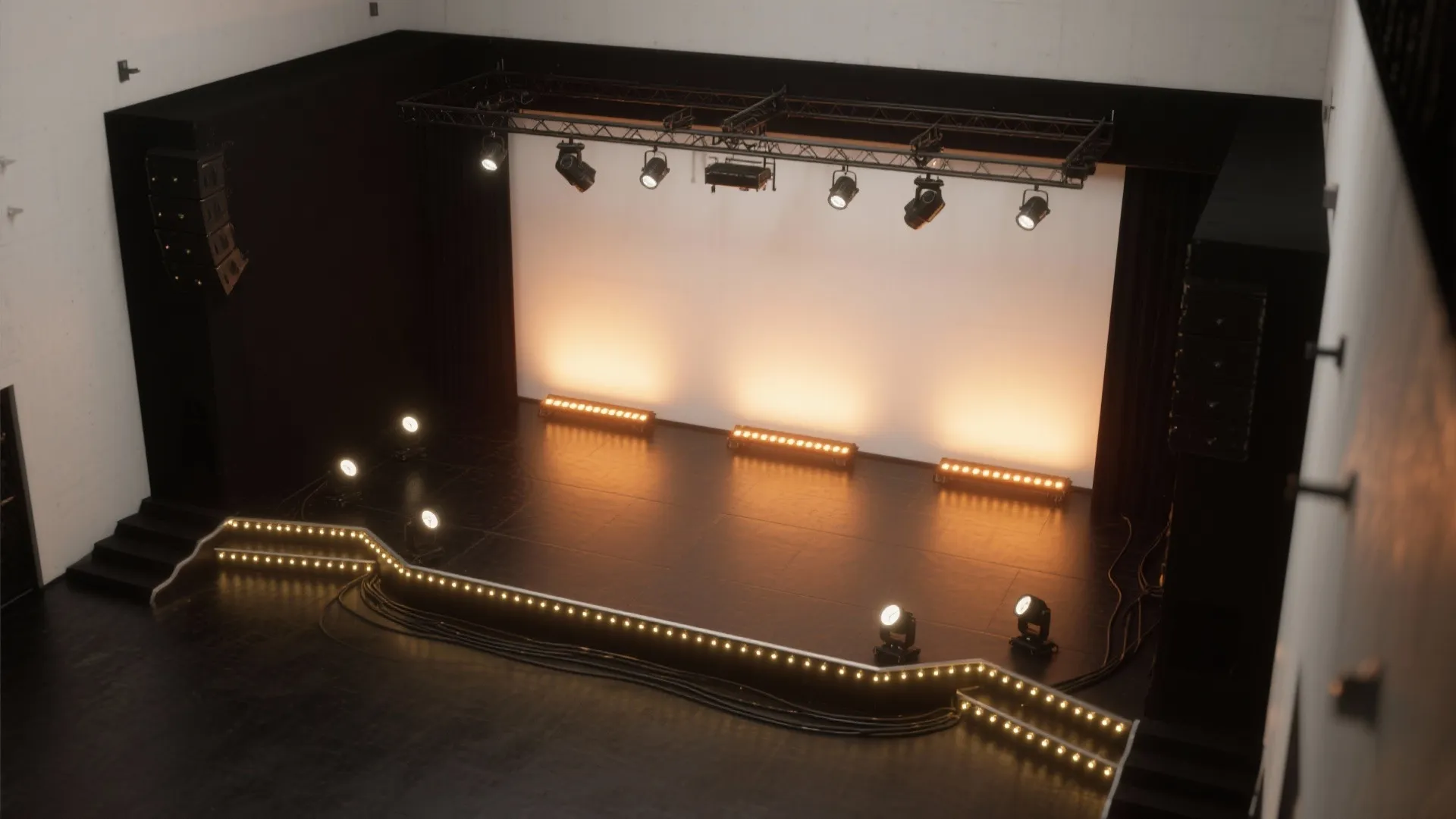 Professional indoor stage lighting setup with several warm light fixtures and a large white screen