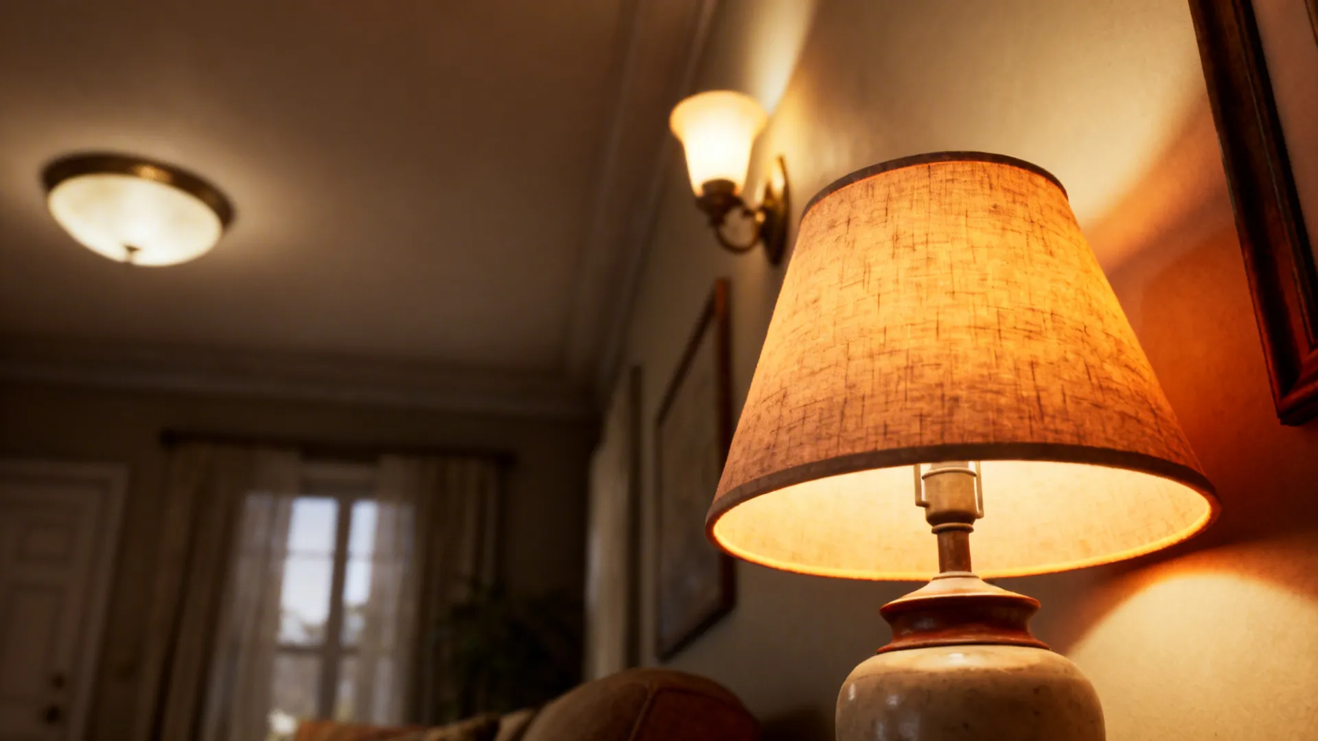 Layered lighting with dimmer, sconce, and table lamp creating warm zones.