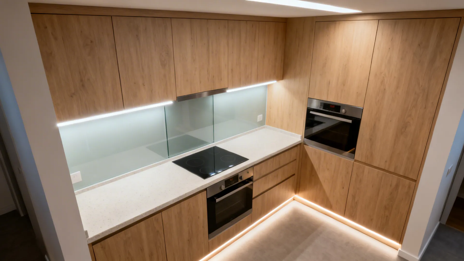 Small kitchen with under-cabinet, ambient ceiling, and toe-kick LED layers shown clearly.