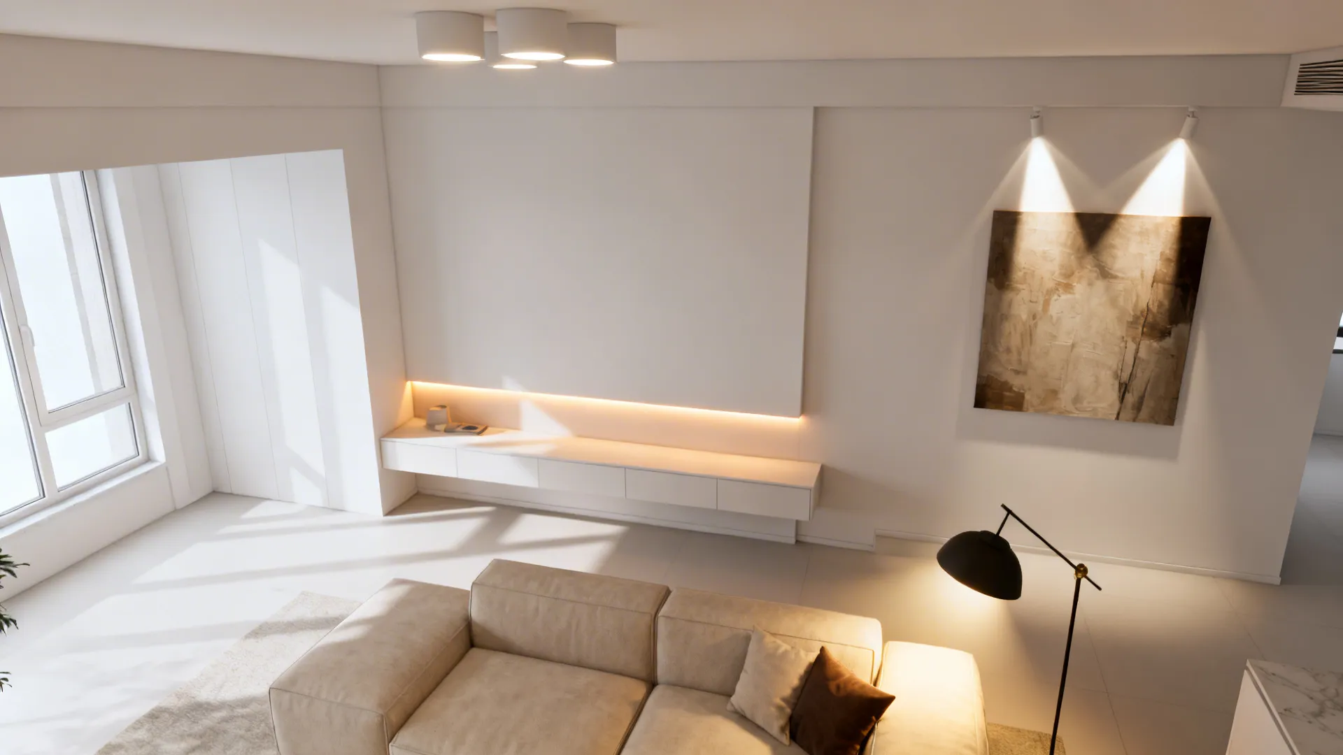 White living room showing layered ambient, task, and accent lighting creating warm glow
