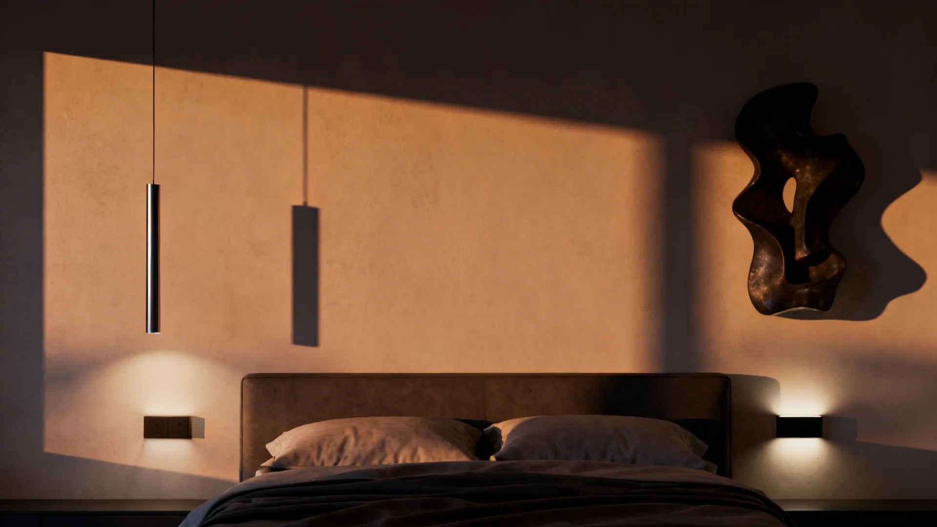 Layered wall lighting and a sculptural piece above the bed creating warm evening ambiance.