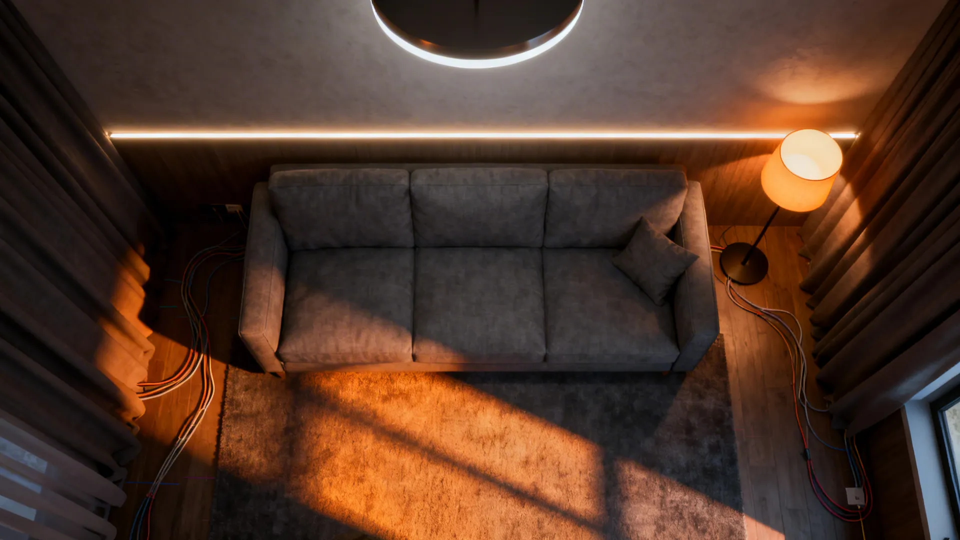 Top down view of grey sofa with floor lamp light fixture and wall light strip design