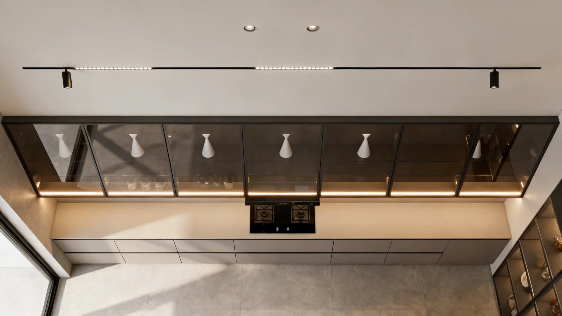 Top down view of a modern kitchen showing glass cabinets with built in warm lights