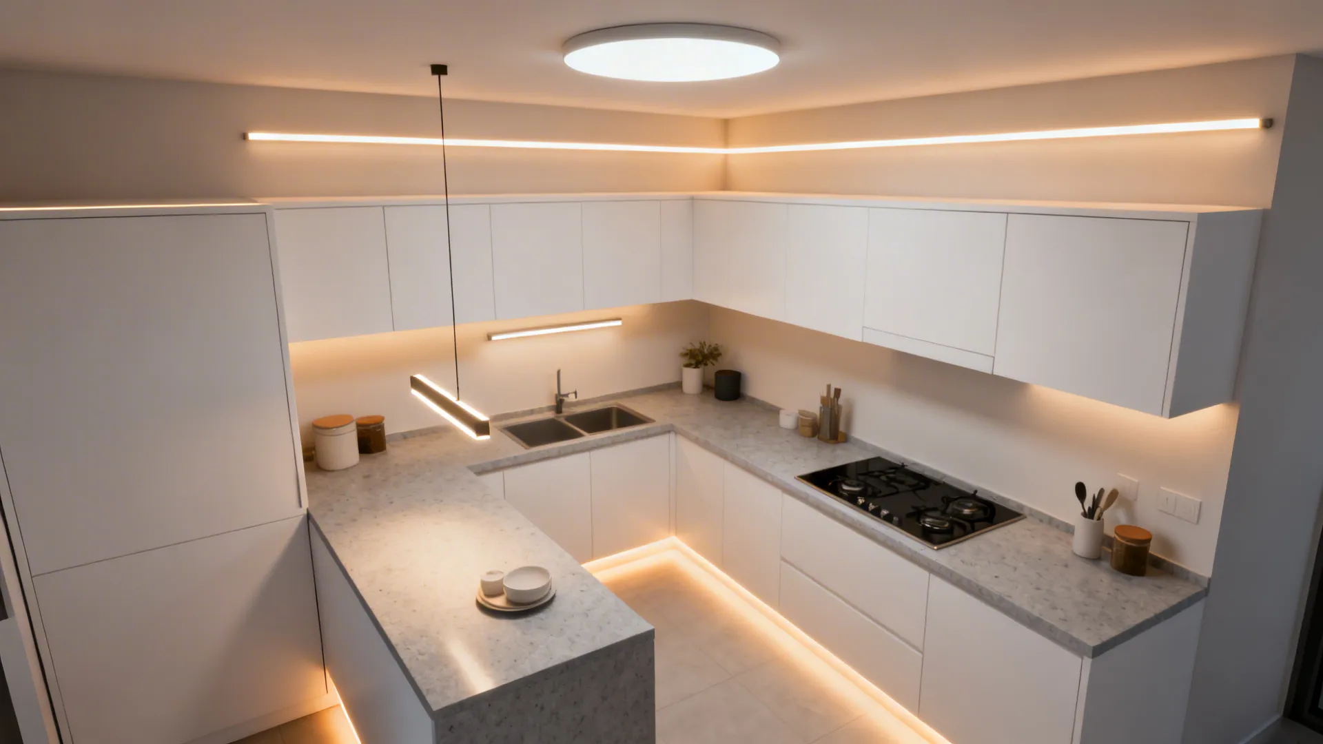 Top-down view of a small kitchen highlighting task LEDs, ambient ceiling light, and an accent pendant.