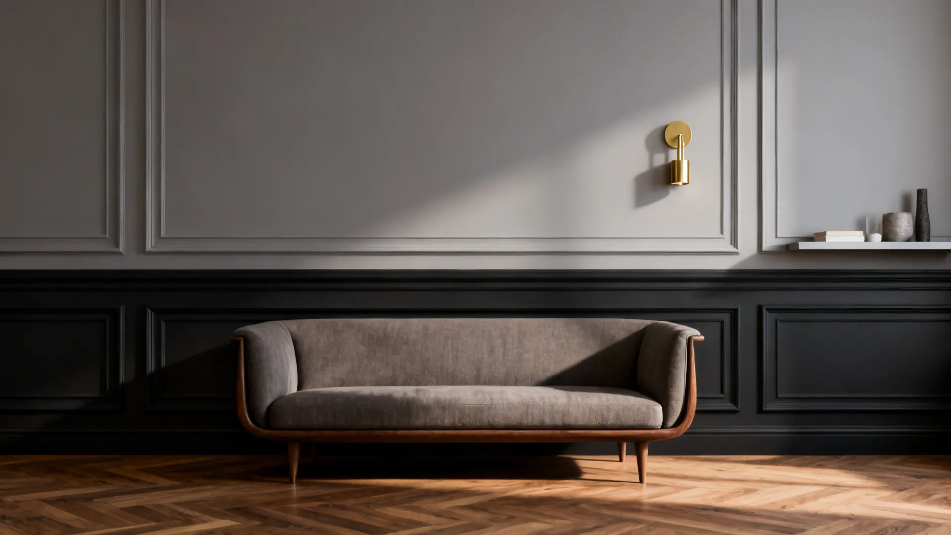 Living room with layered moulding painted deep charcoal against a dove-gray field, creating architectural depth.