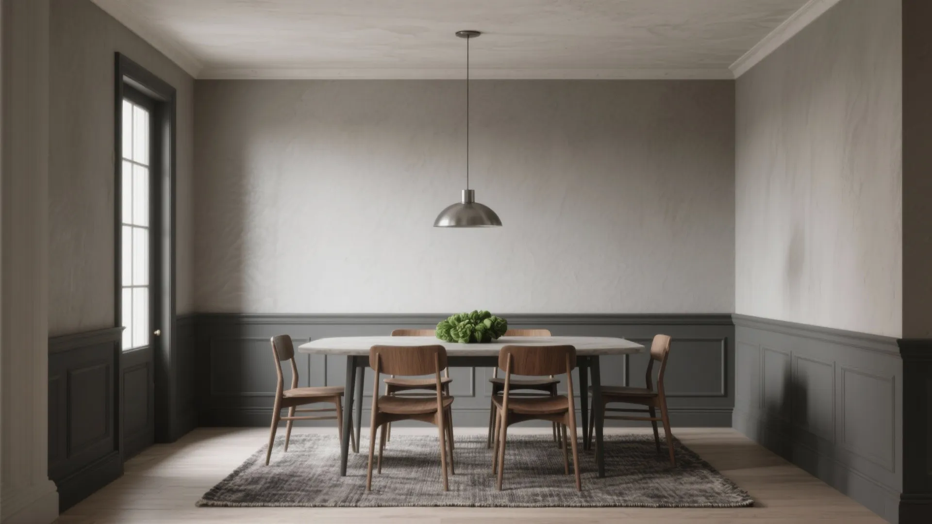 Small dining room featuring layered gray tones, textured plaster, wool rug, and oak chairs.