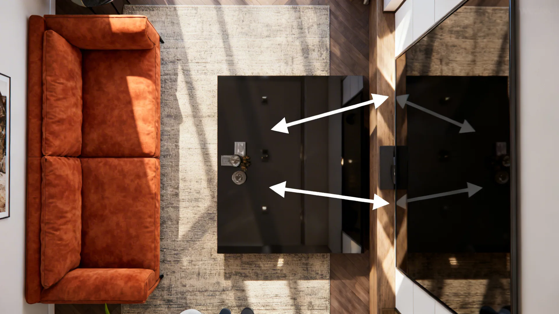 Top-down layout showing a burnt orange sofa opposite a glossy black surface to bounce light