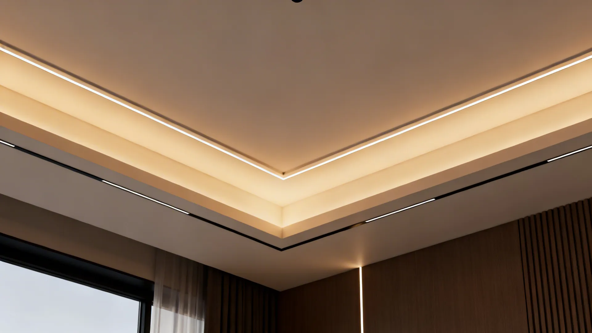 Tray ceiling with integrated LED cove and linear profiles creating soft indirect ambient light.