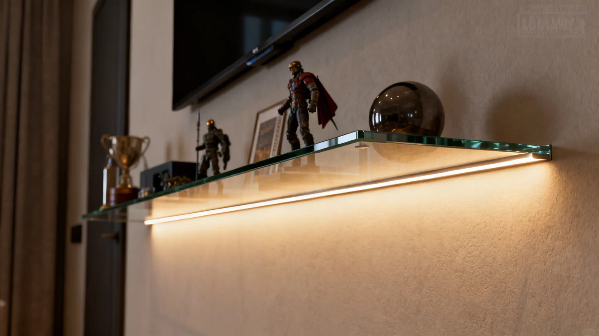 Glass shelf with integrated LED edge lighting illuminating collectibles on a media wall