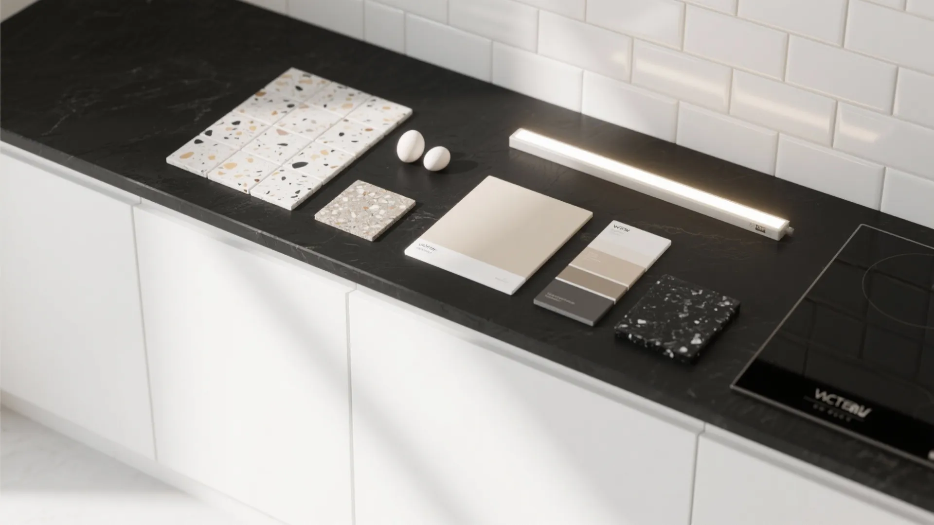 Flat lay of pale backsplash tiles, paint swatches, an LED strip, and a black quartz sample.