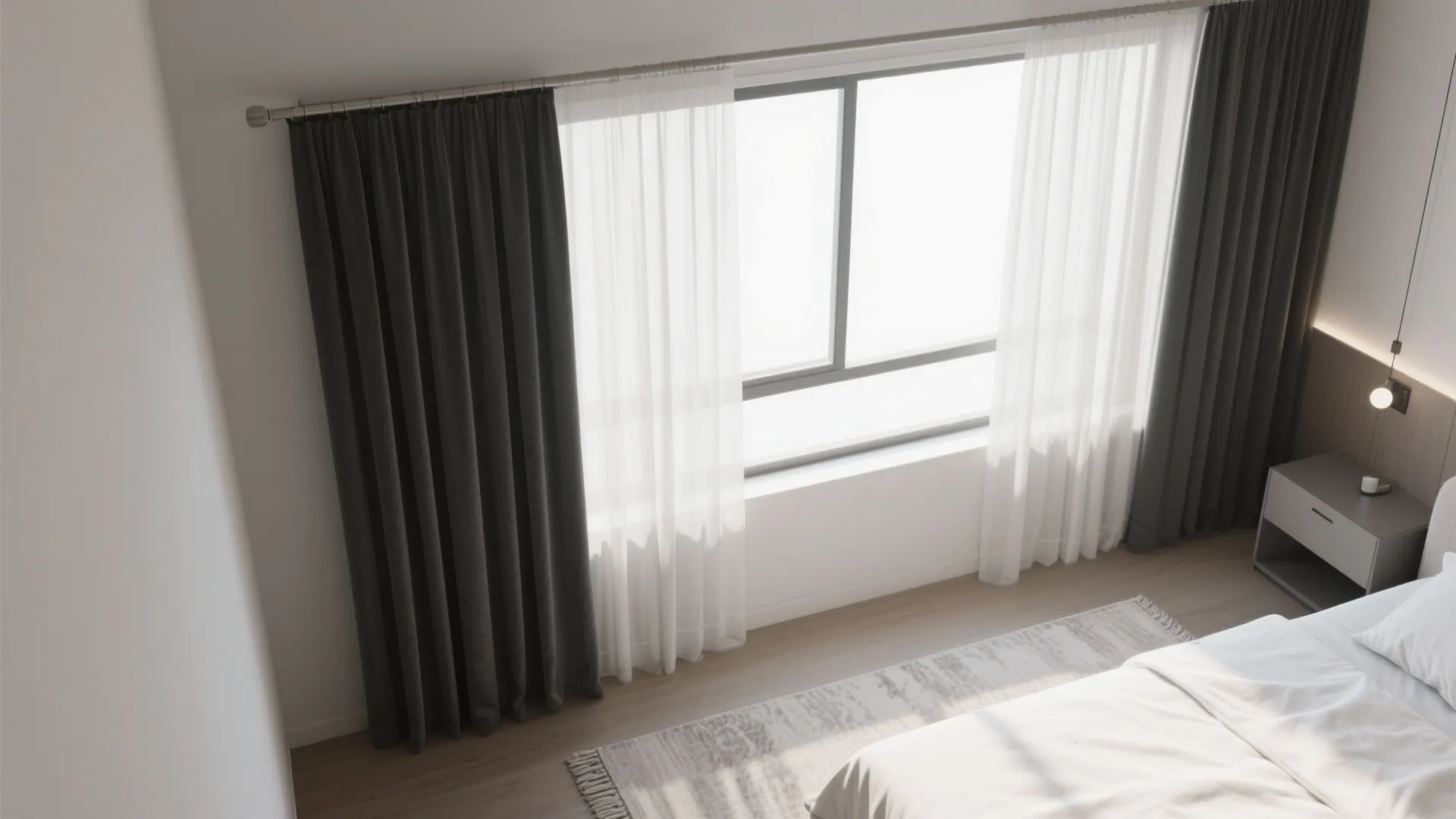 High angle bedroom view showing large windows with dark and white curtains plus grey rug