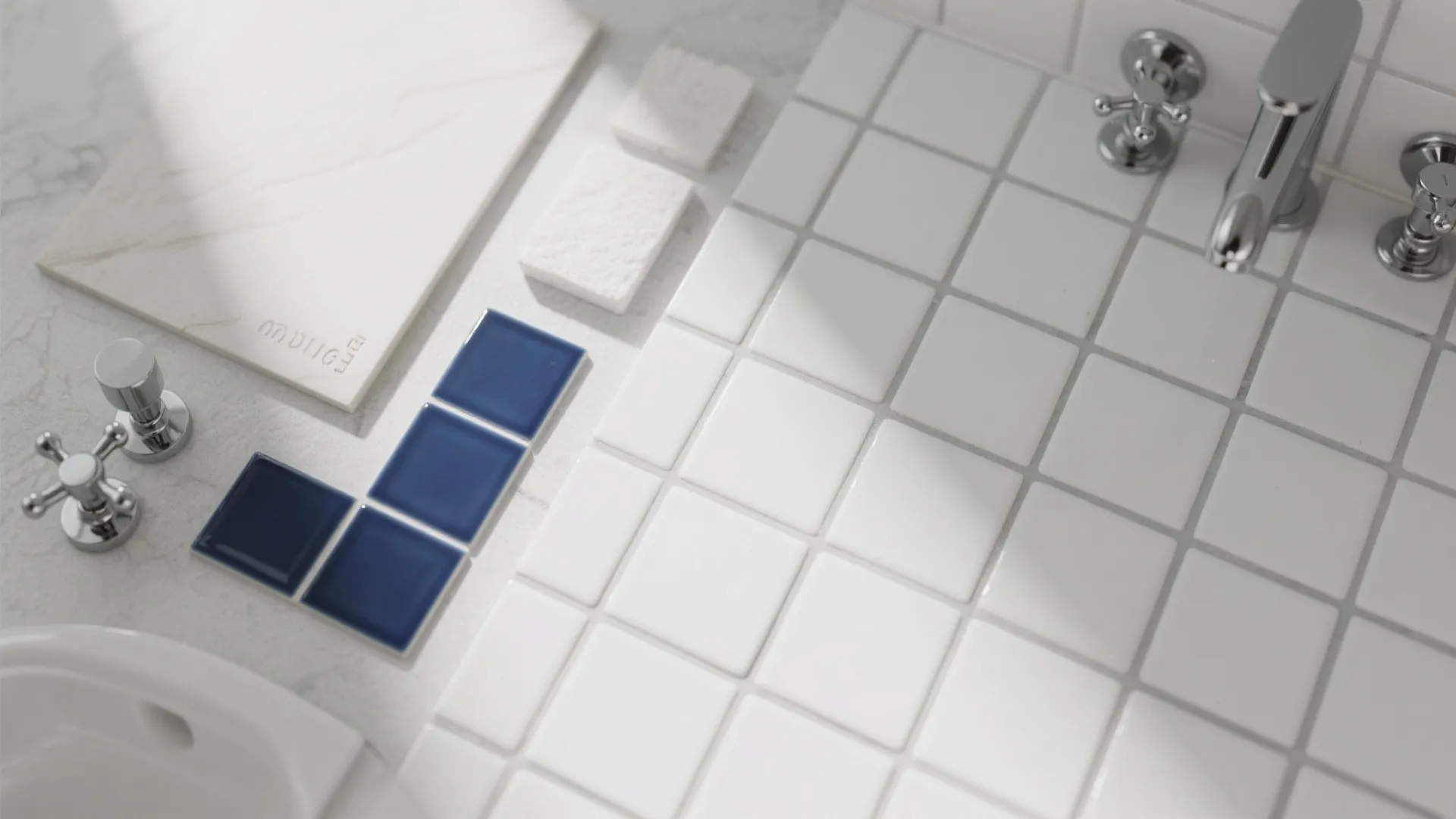 Light neutral bathroom material palette with navy accent tile