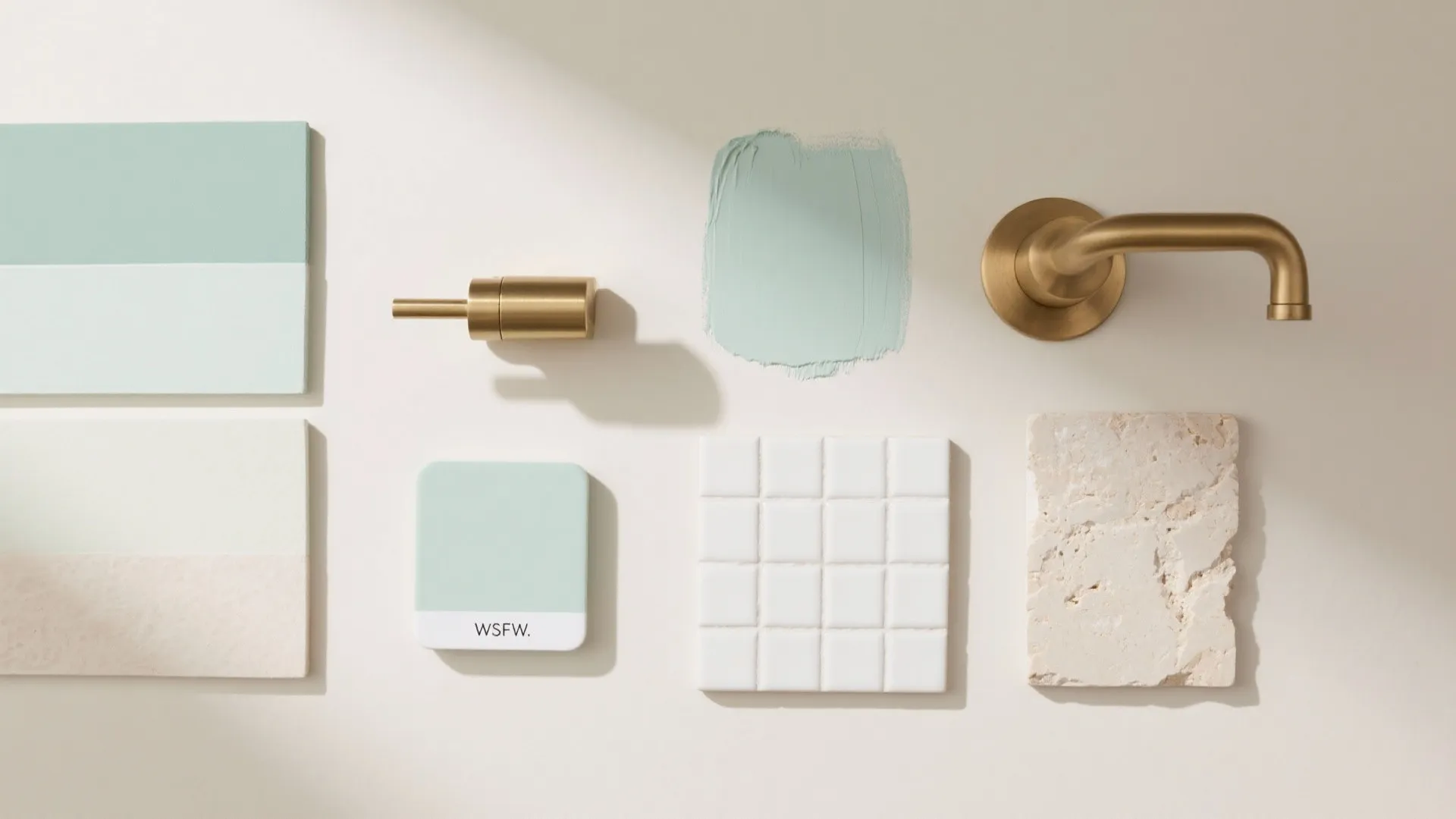 Interior design mood board with green paint samples white tiles gold faucet and stone material
