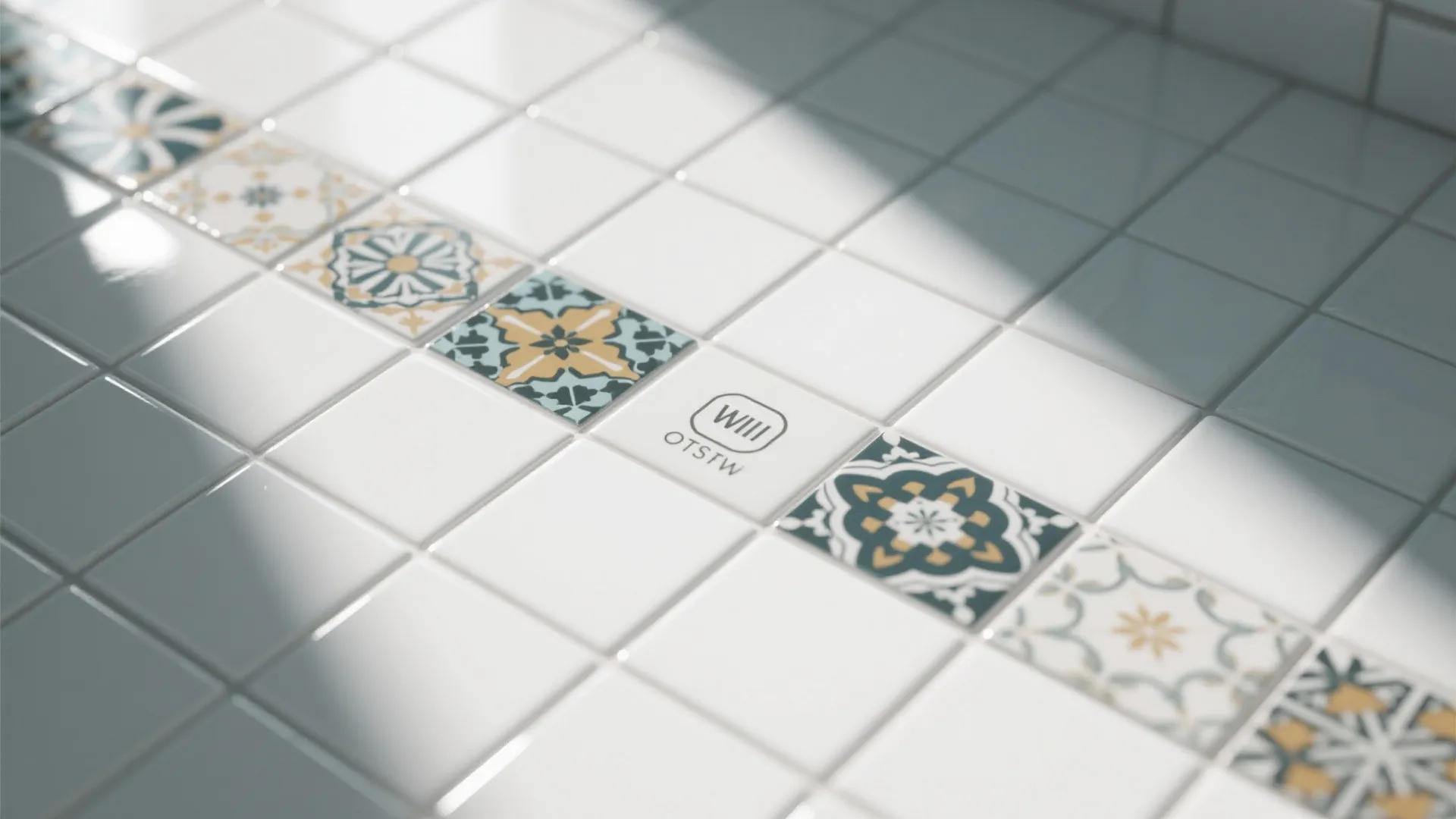 White square floor tiles with a decorative row of blue and yellow patterned ceramic tiles