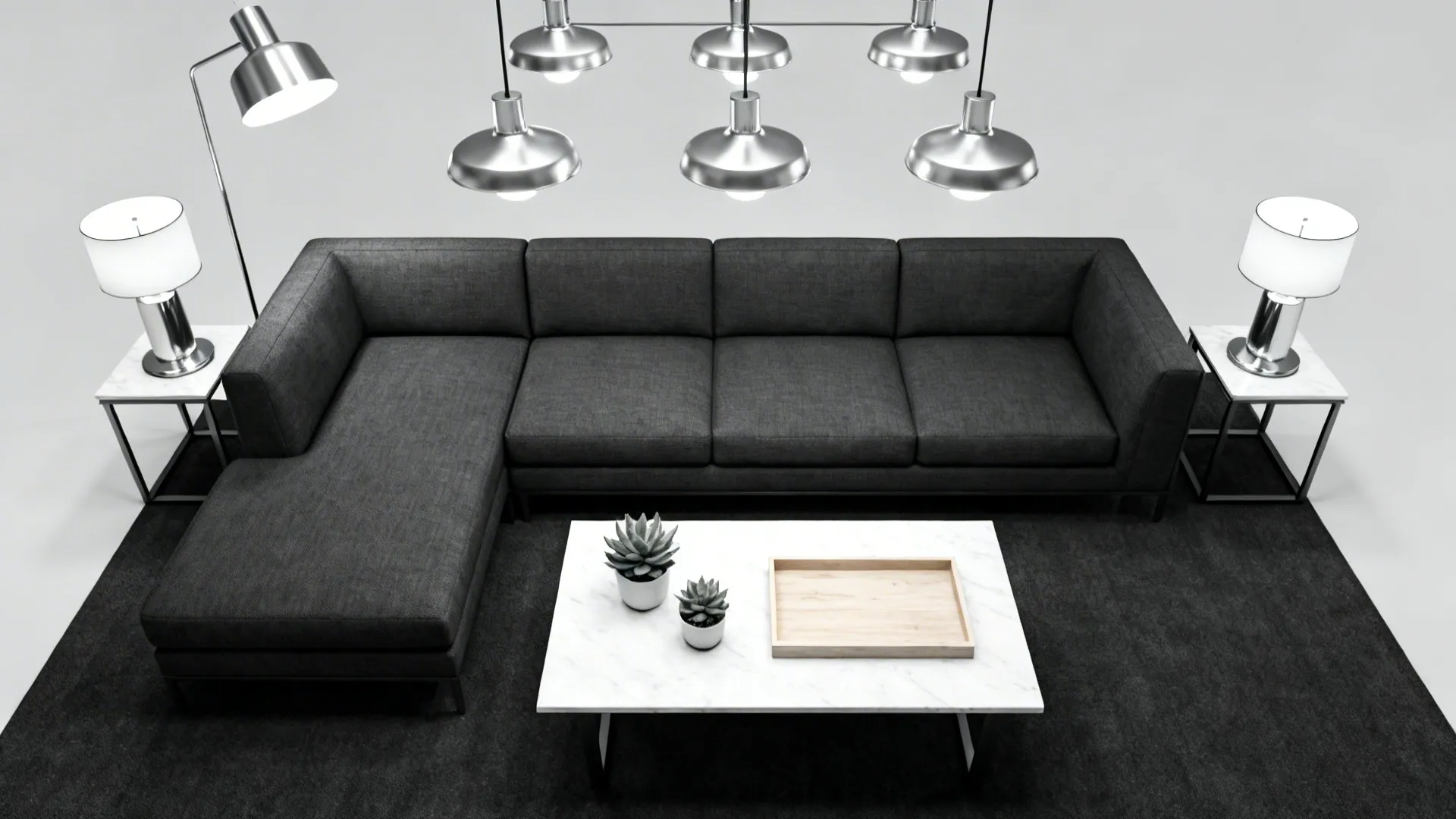 Top view of a grey sofa, marble table, ceiling lights, and lamps on a dark rug
