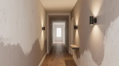 Modern Hallway Design with Textured Walls and Wall Sconces