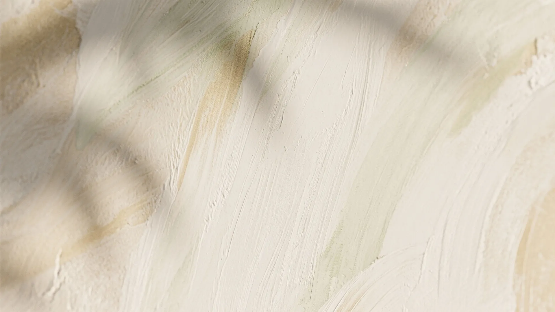 Macro view of beige wall paint texture with soft brush strokes and gentle tree shadow effects