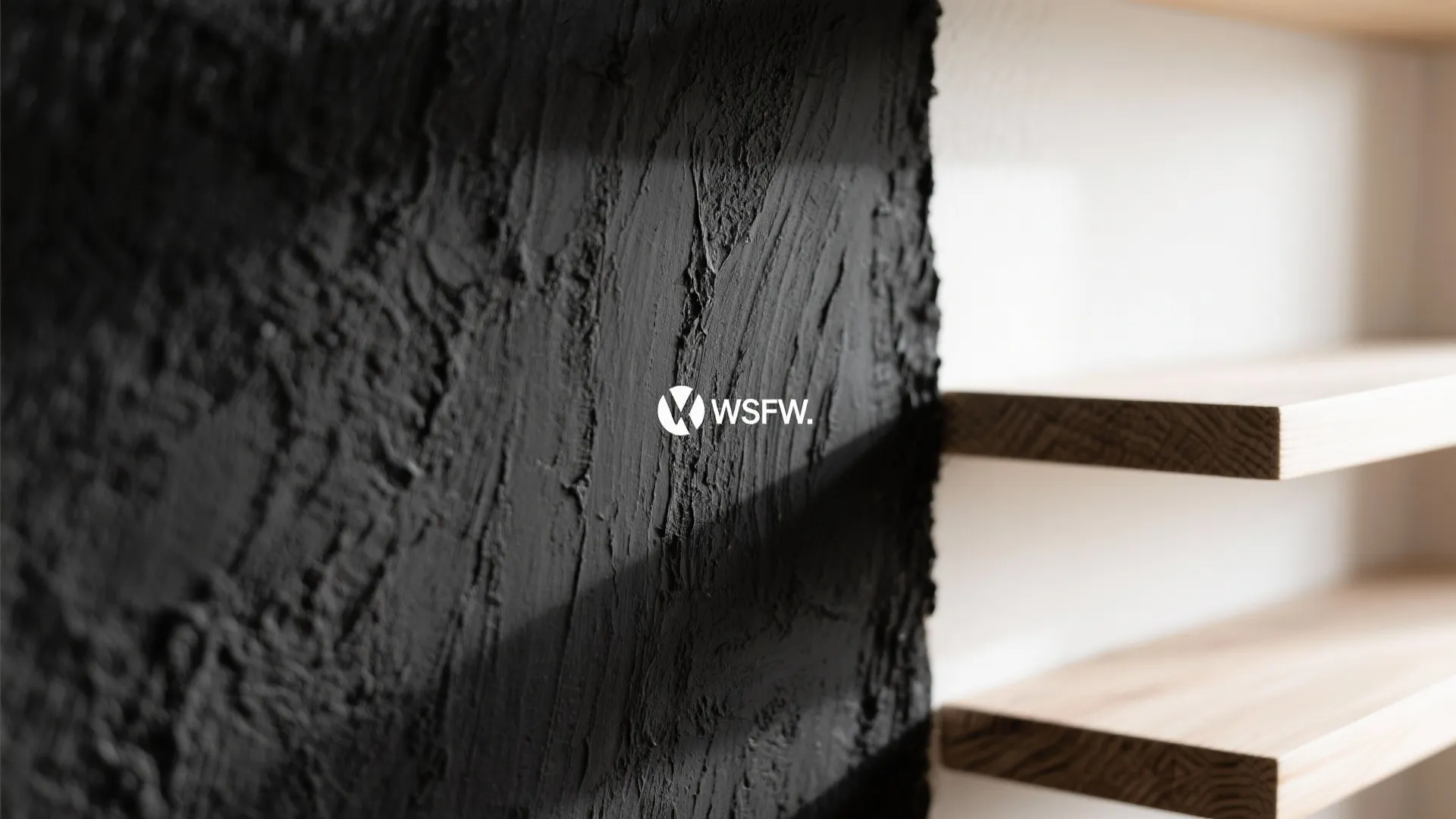 Micro-Textured Black Accent in a White Room