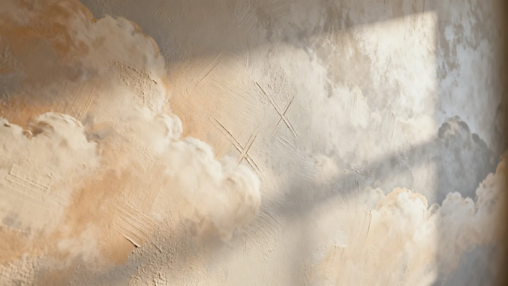 Macro of limewash wall showing velvety texture and soft tonal variation.