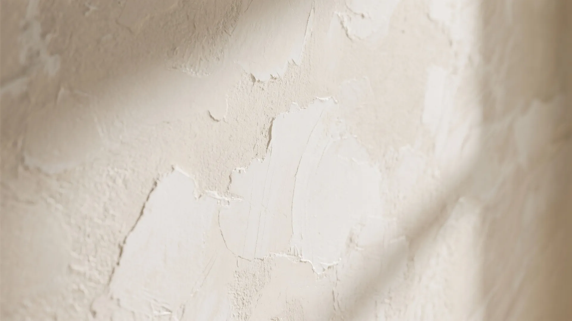 4) Textured Mineral Looks: Limewash, Plaster, and Soft Cloudy Finishes