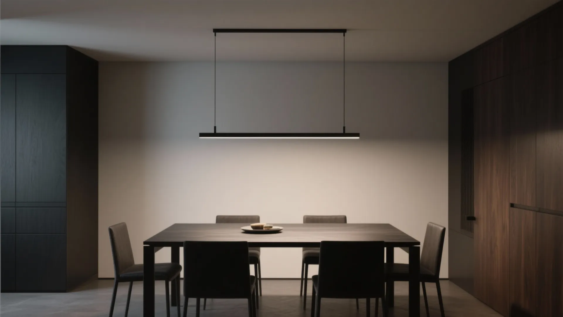 Low ceiling dining room with slim linear pendant light