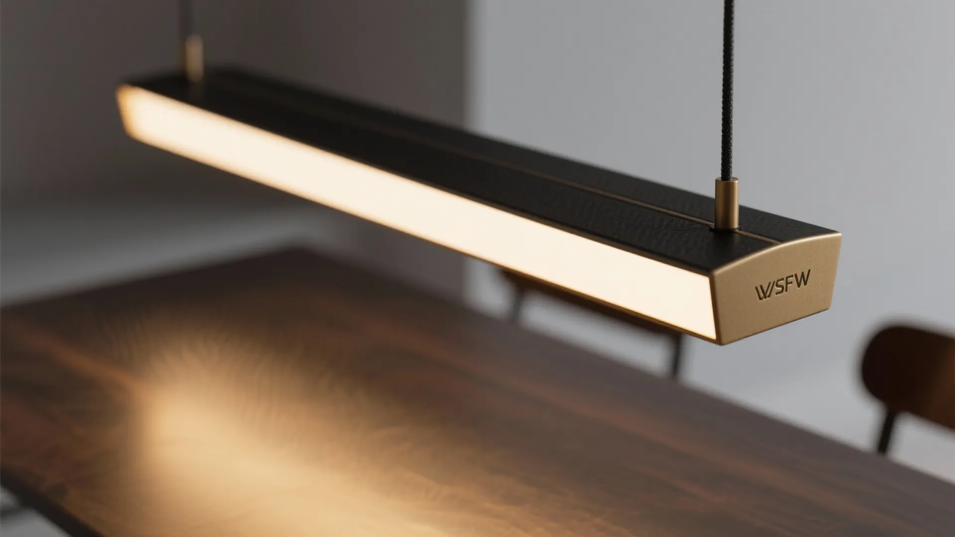 Compact linear pendants for rectangular tables