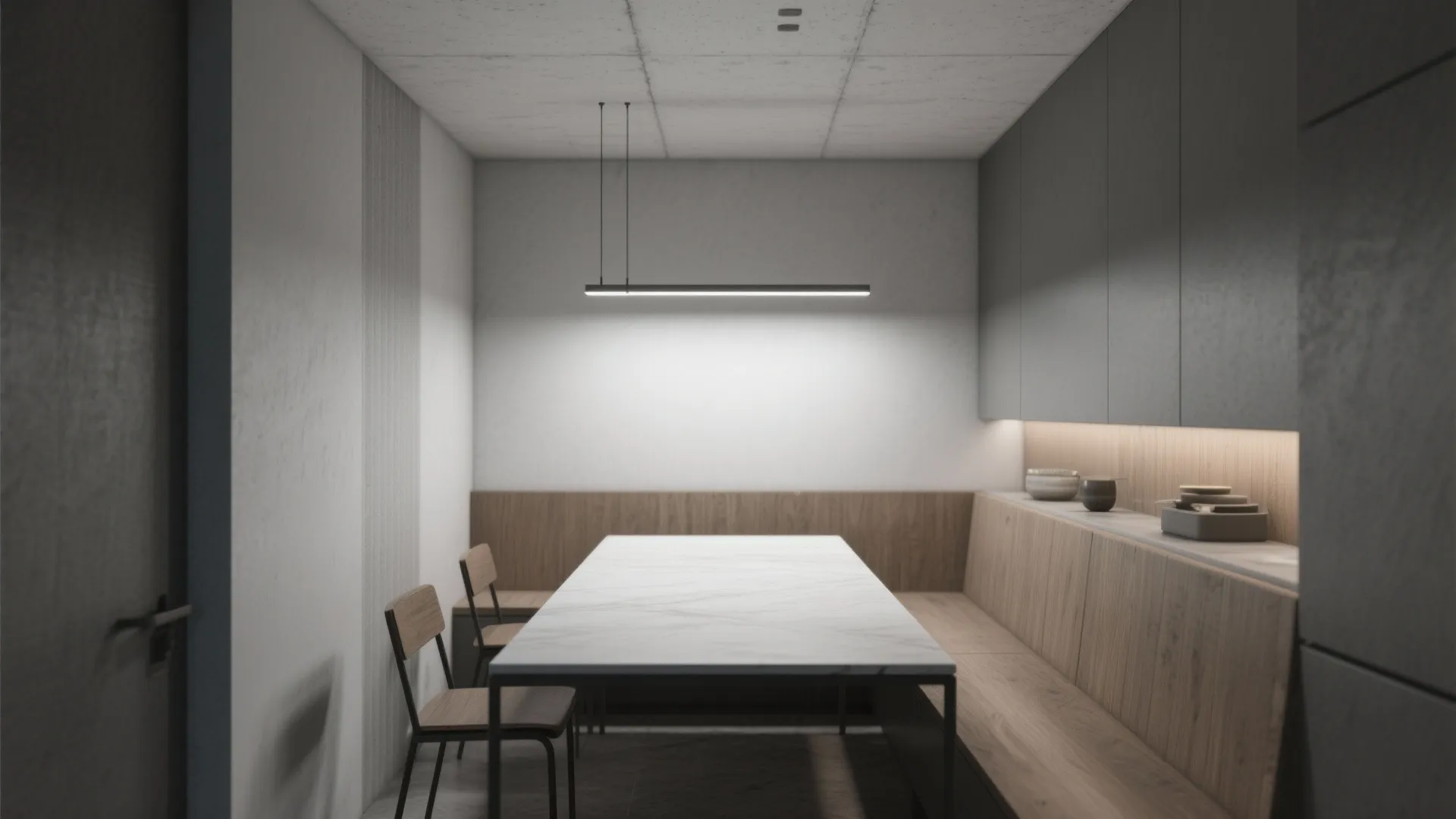 Minimalist dining room with marble table wooden bench grey wall cabinets and thin ceiling light