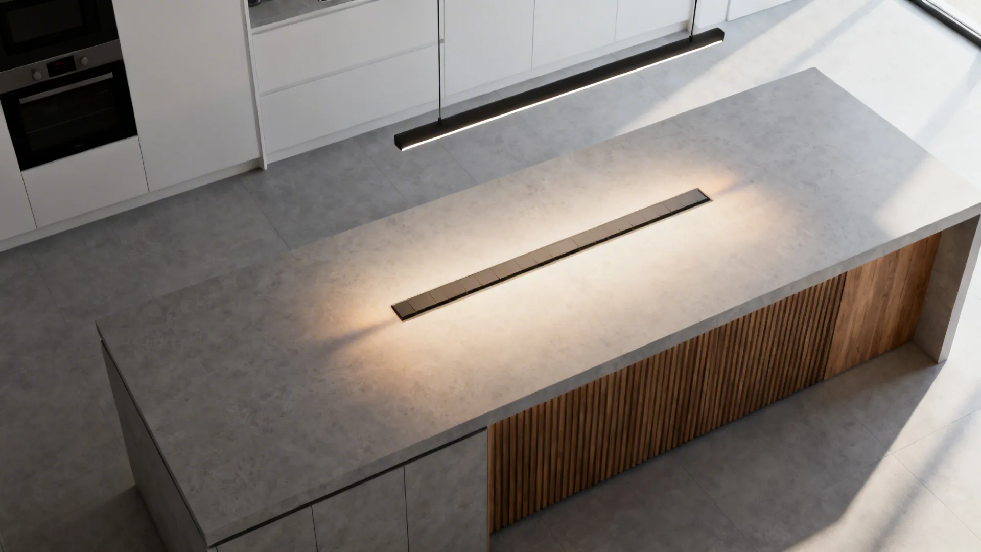 Modern grey kitchen island featuring built-in light strip black ceiling light and white cabinet background