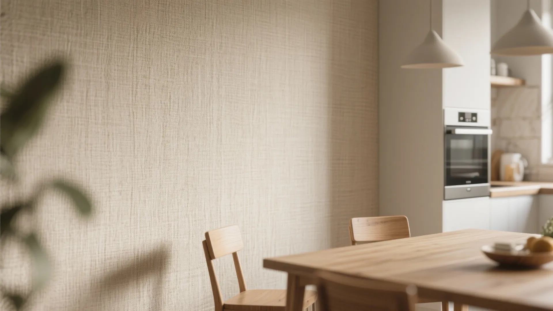 Close-up of linen-textured wallpaper in a small dining space