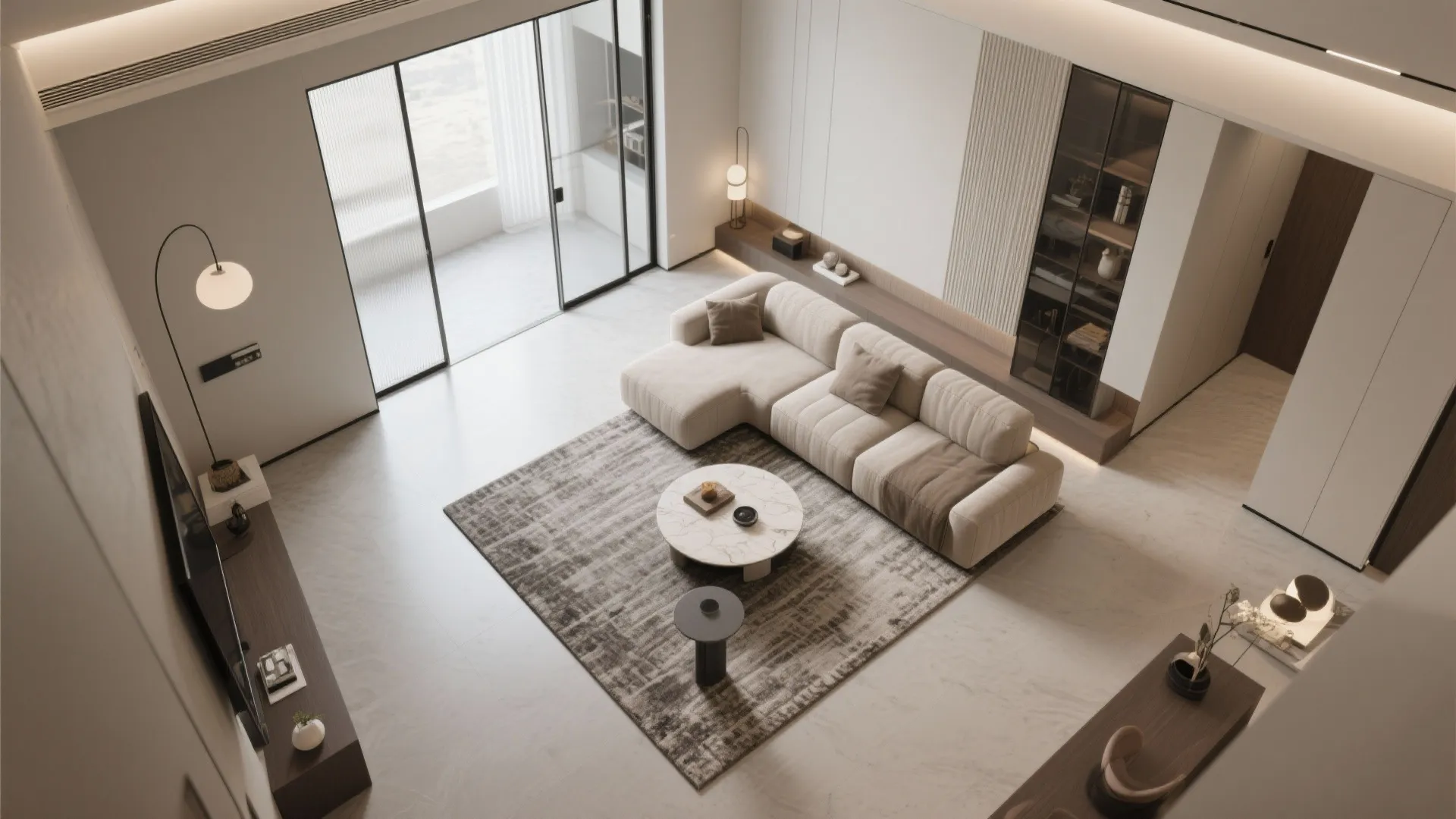 Top-down view showing L-shaped sofa, round table, and open circulation path in a narrow living room.