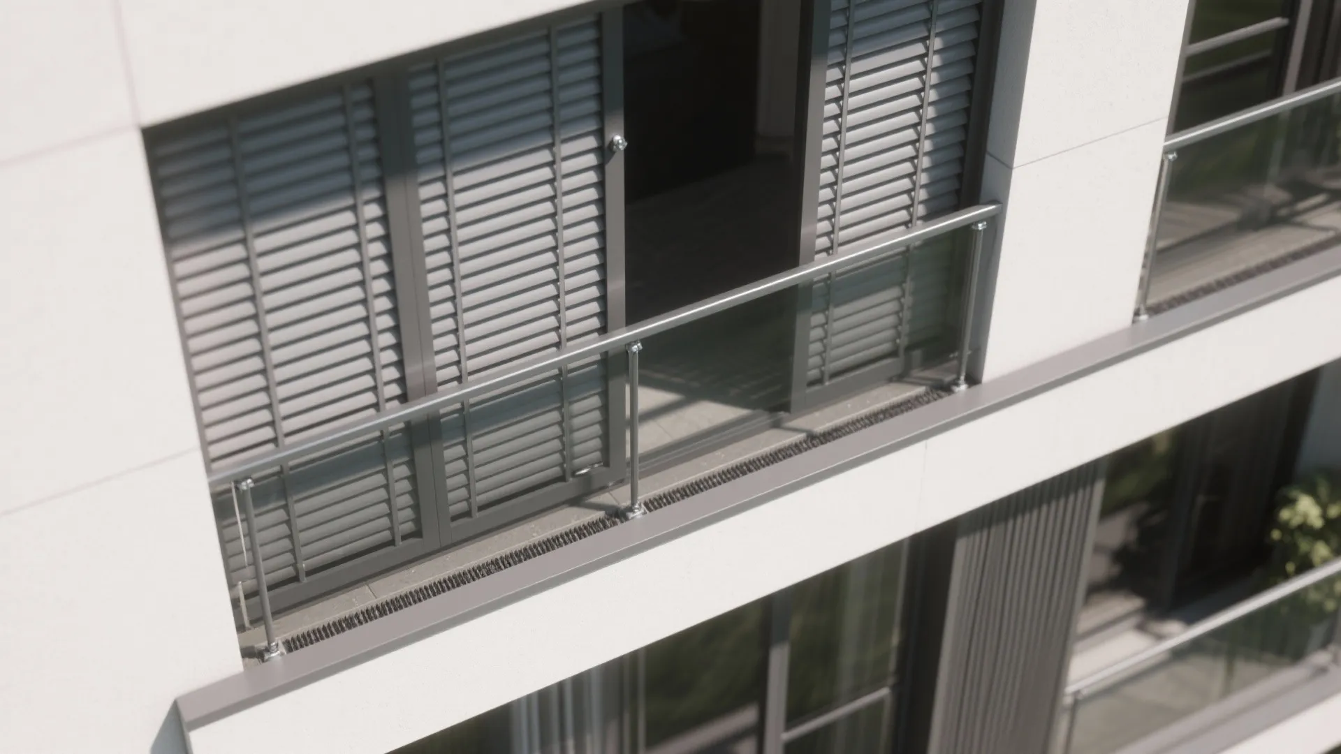 Top down view of a modern balcony with grey window shutters and a glass handrail system