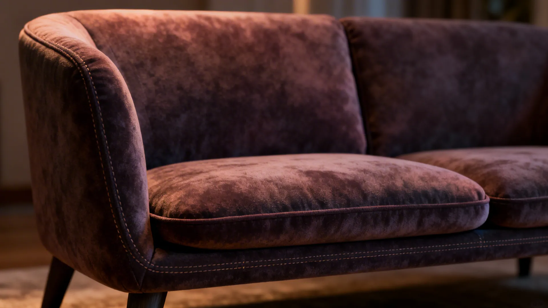 Close-up of a loveseat highlighting back height, cushioning balance, and replaceable inserts for comfort.