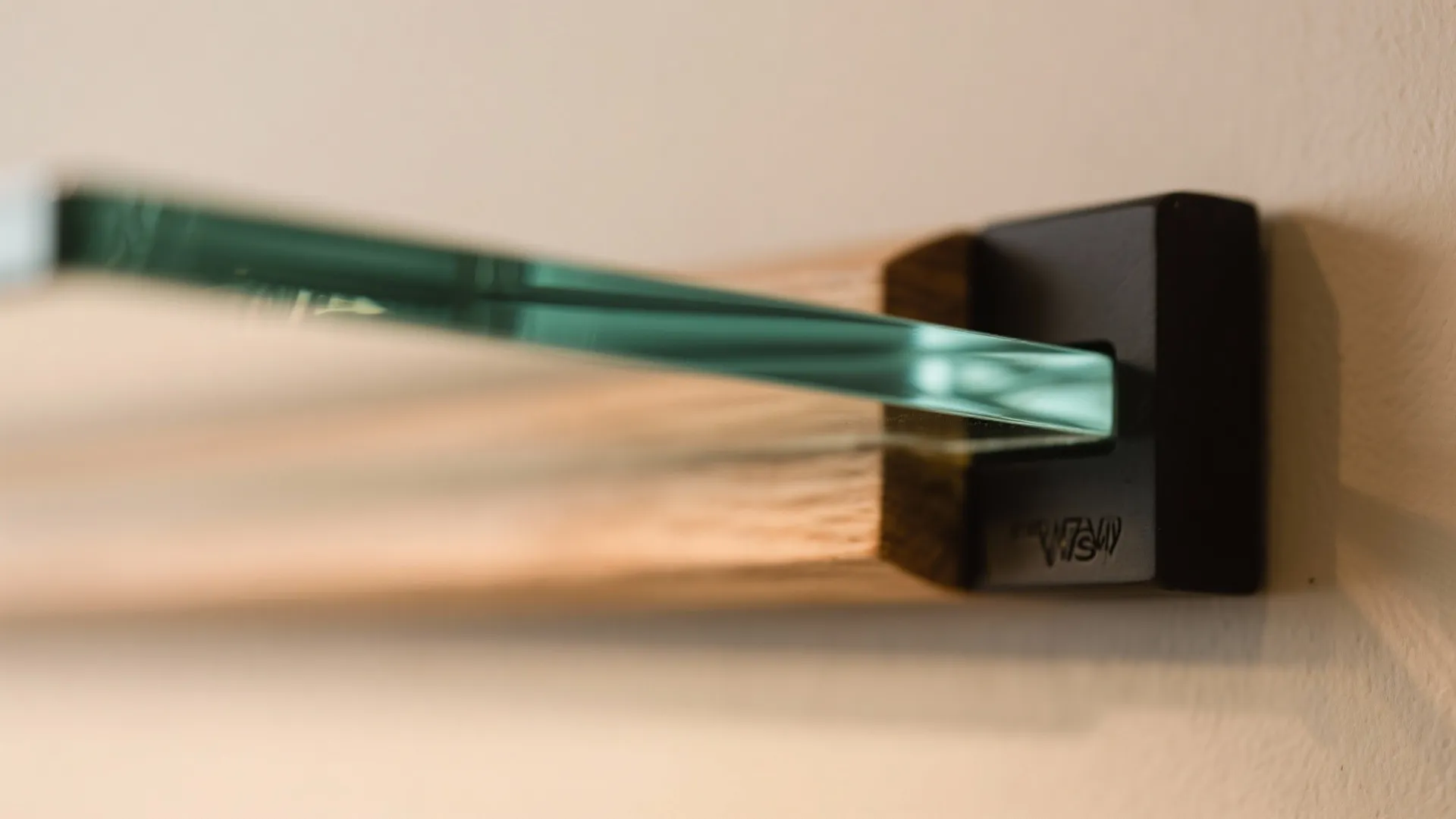 Glass-backed panels and mirrors for brightness