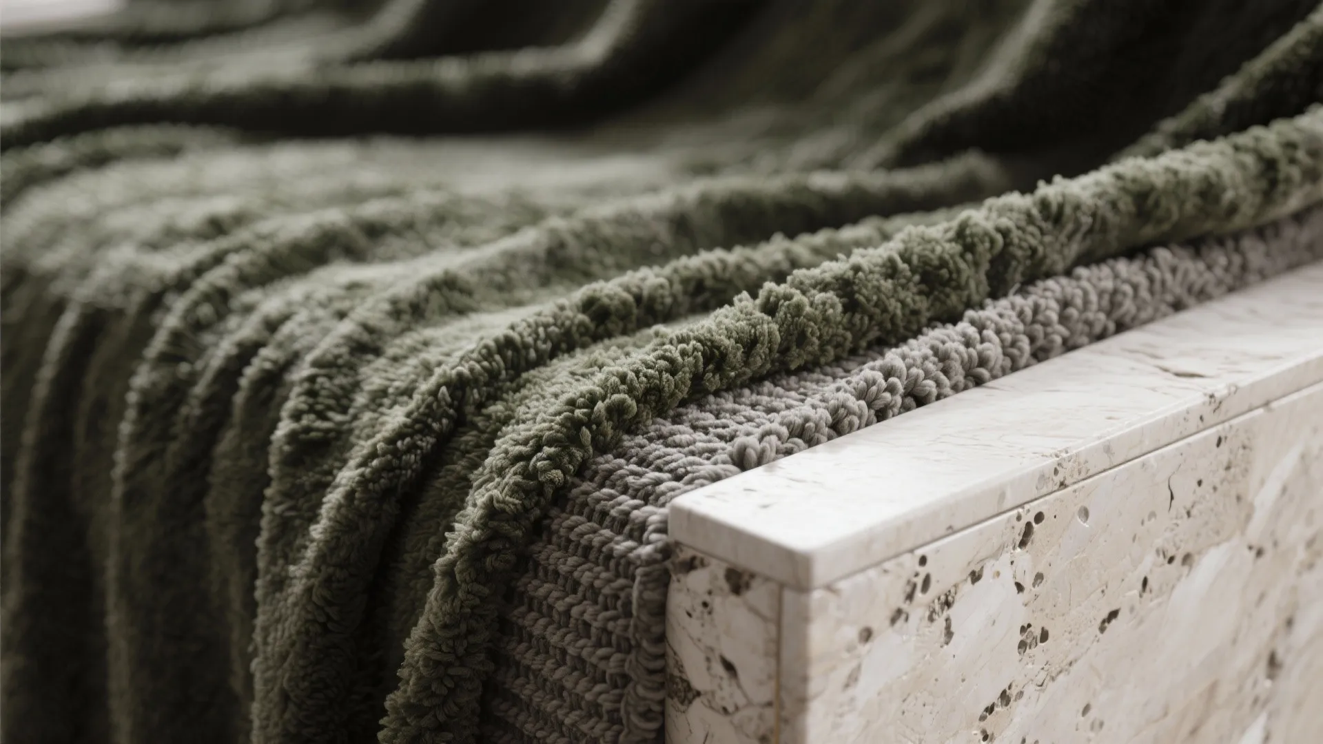 Textural Contrast: Velvet, Bouclé, and Stone