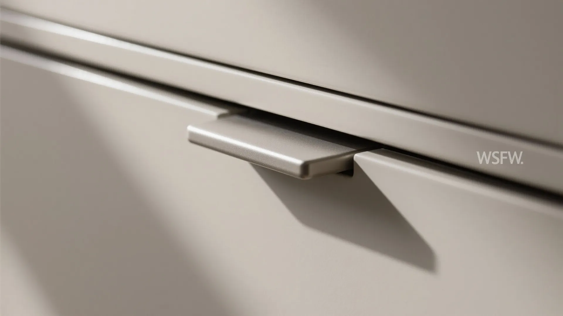 Macro of a matte-lacquer soft-close drawer showing refined minimalist details.