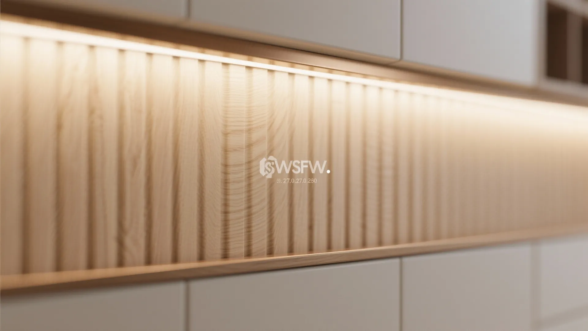 Close up of a vertical wooden wall panel featuring a warm horizontal light fixture design