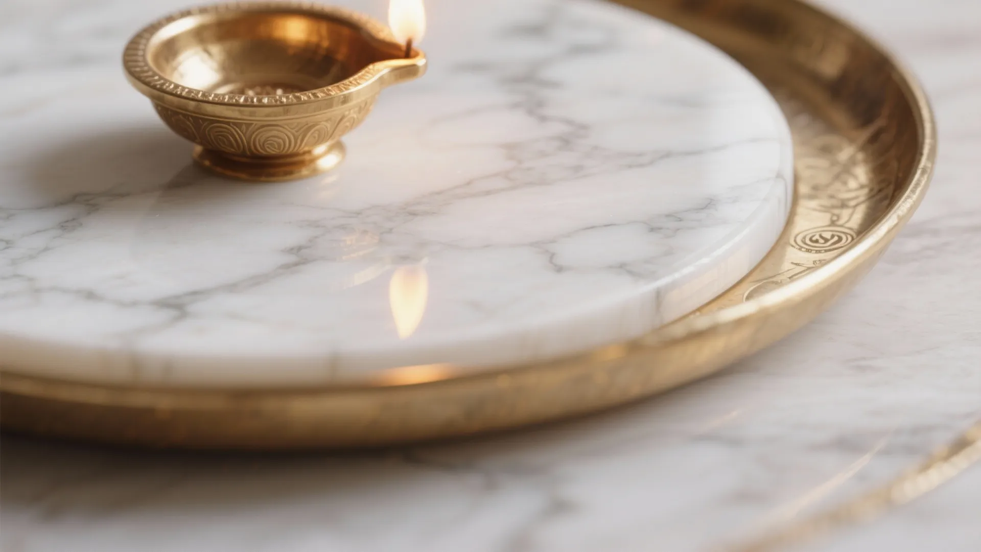 Close up shot of a small brass oil lamp on a white marble plate and tray