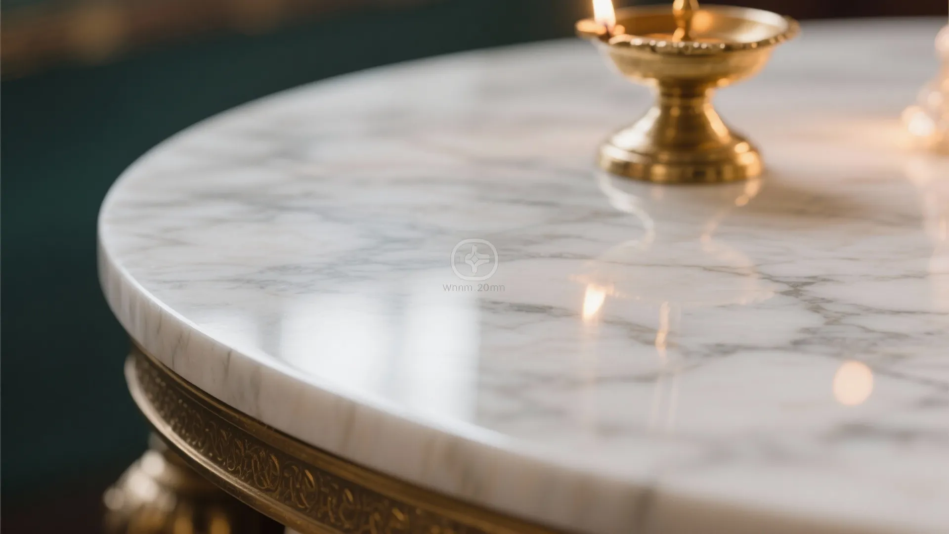 Close up of white marble table with gold edge and small brass lamp on top surface