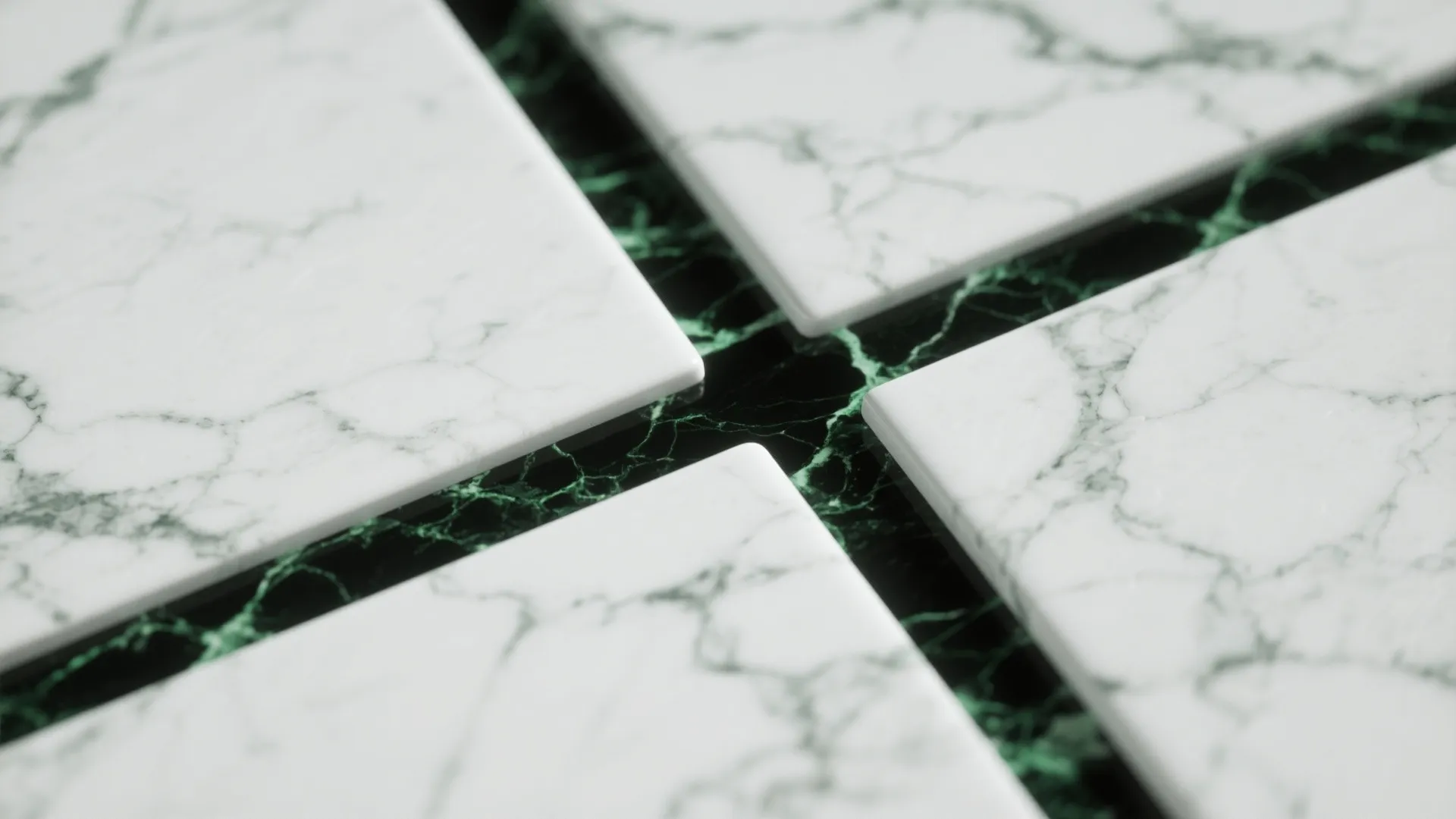 Close up of white marble tiles with green veins showing natural texture and stone pattern