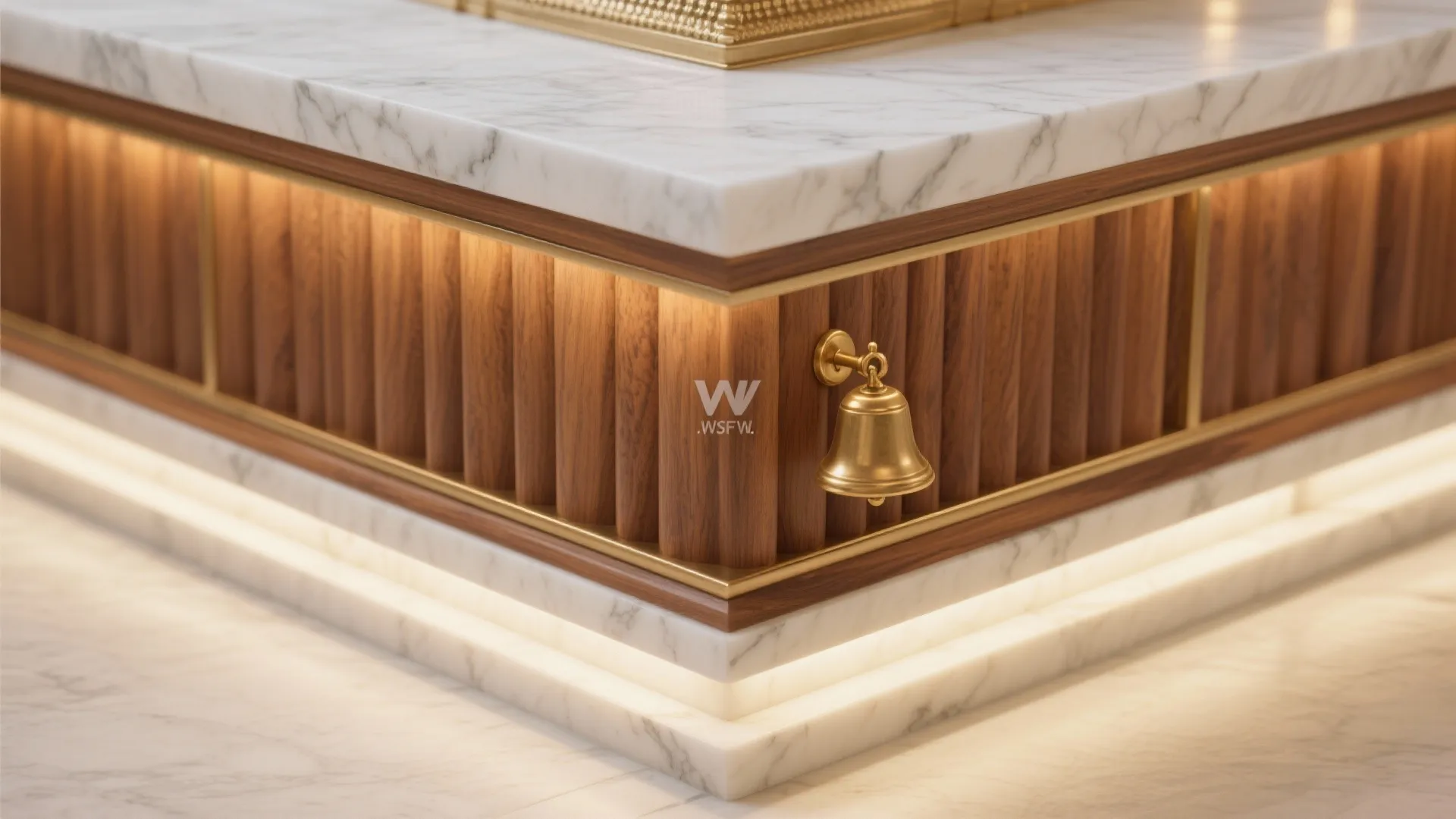 Close up of marble table corner with wood wall panel and gold bell decoration piece