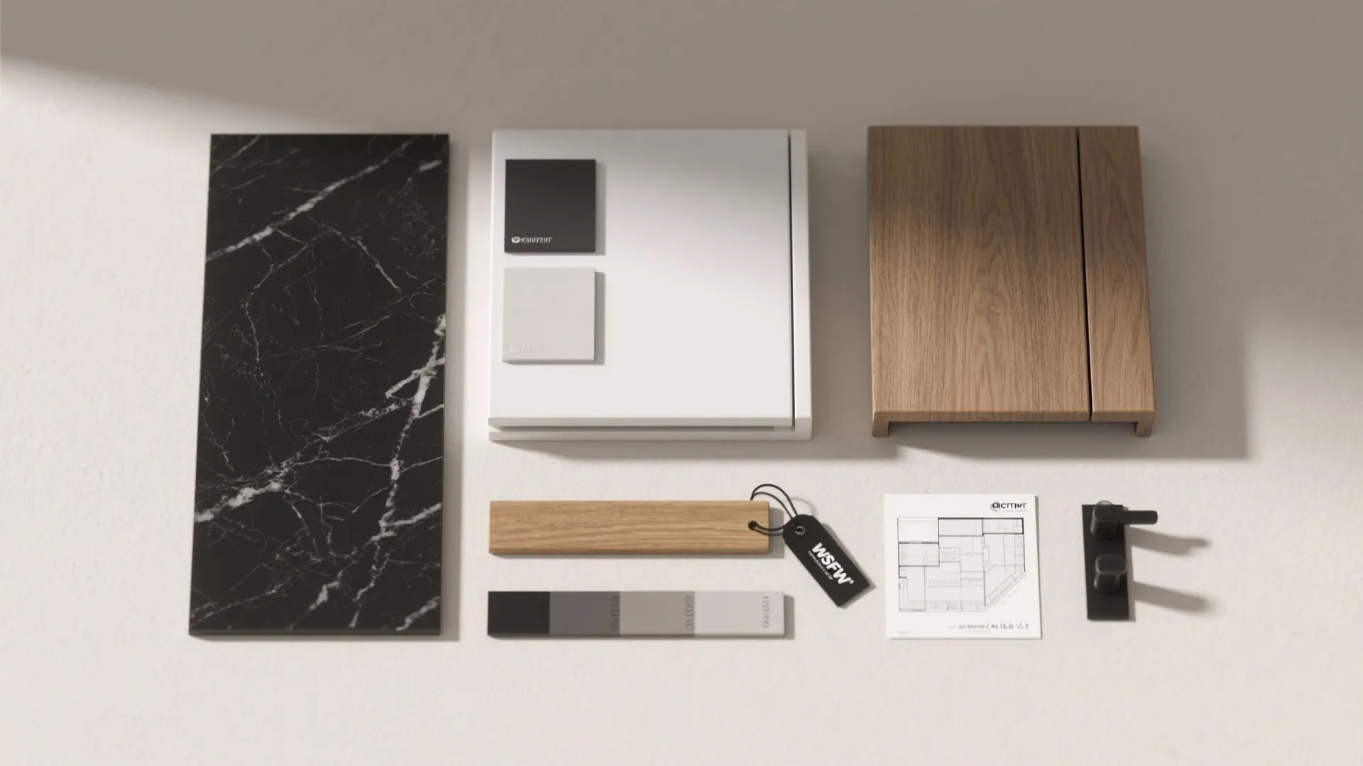 Flatlay of black quartz, porcelain, white cabinet, oak strip, and black hardware samples with a 3D planner printout.
