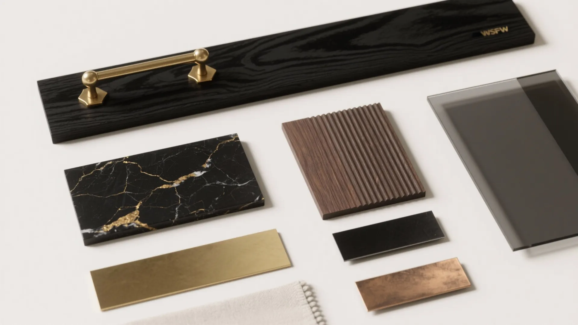 Interior design materials sample collection with black marble wood gold metal and fabric on white