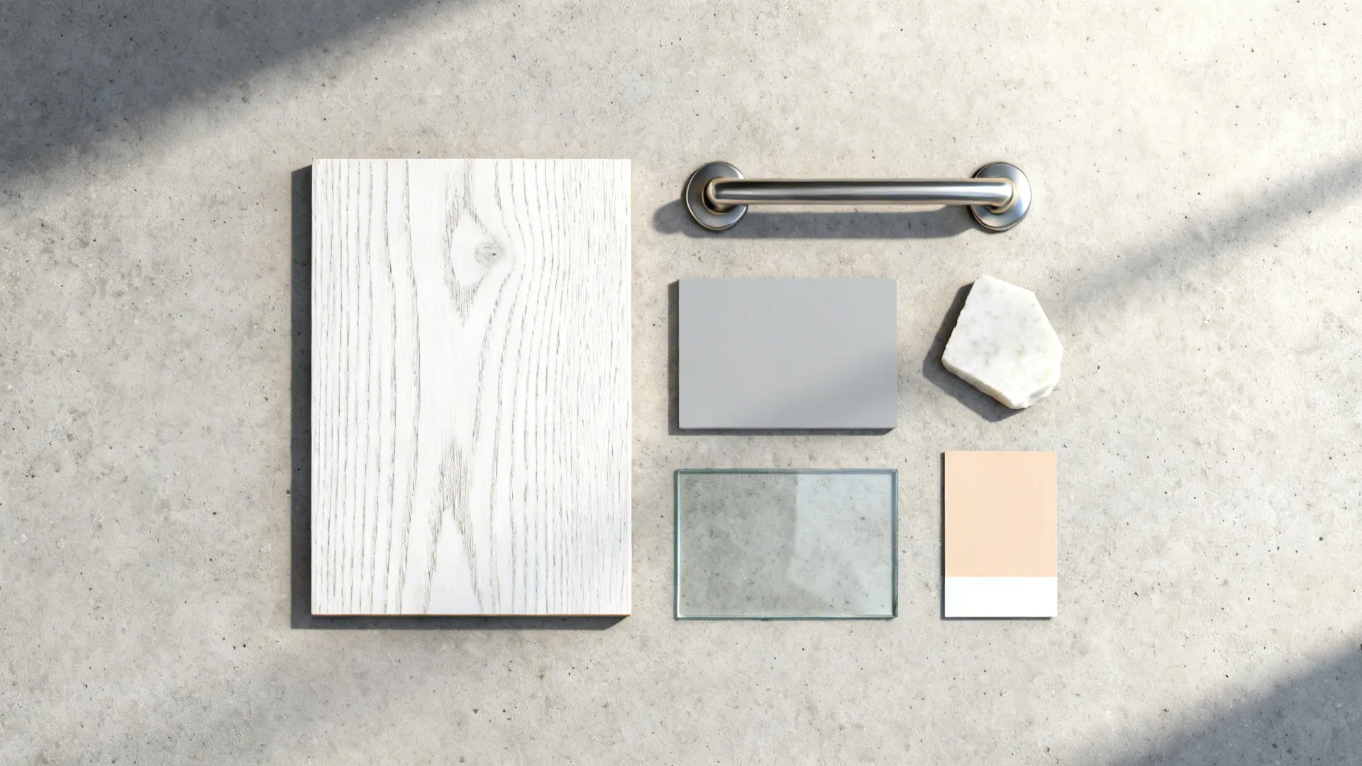 Flat lay of white oak, matte nickel pull, gray paint, low-iron glass, and warm white quartz samples.