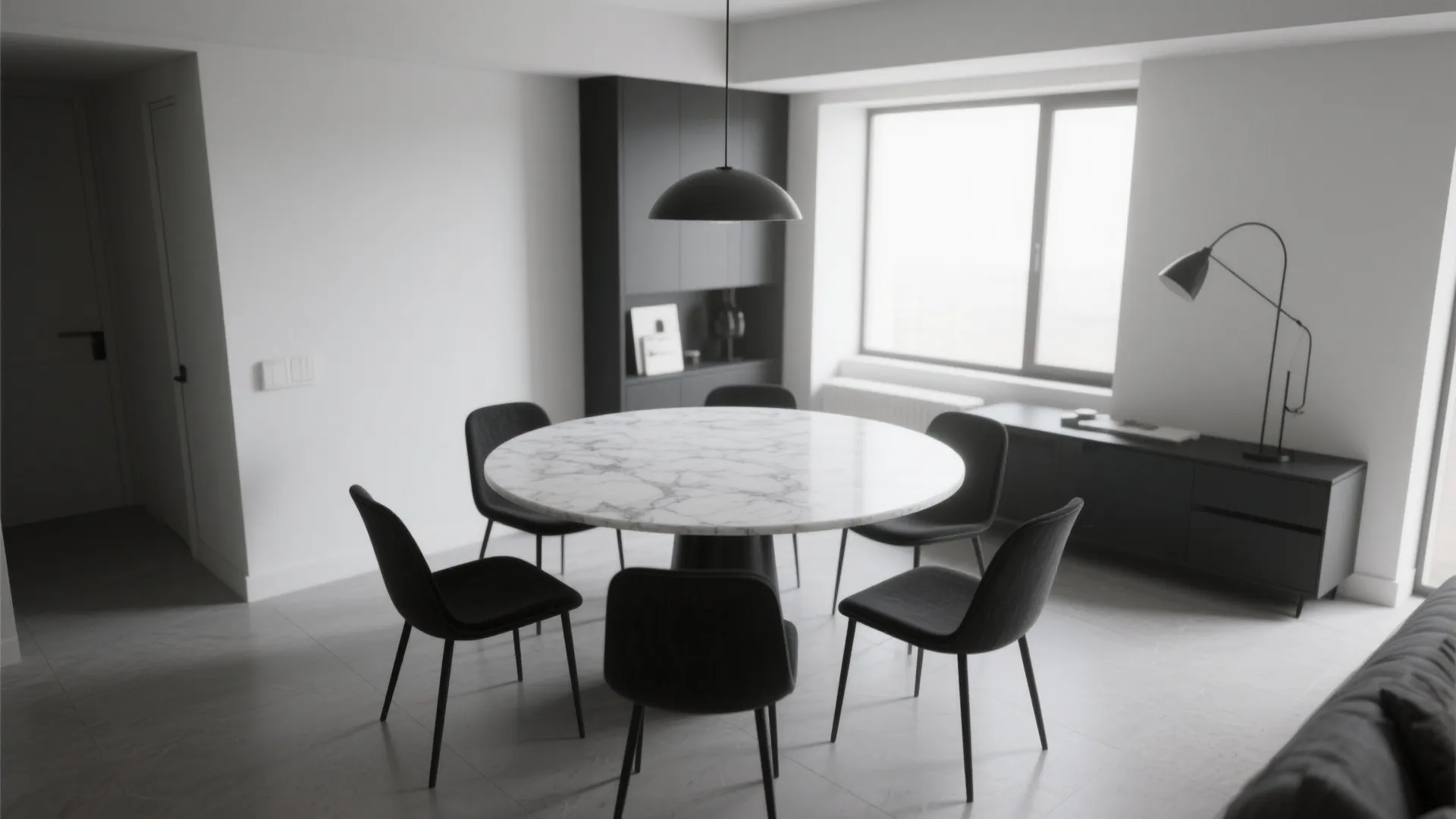 Modern dining area with matte black painted chairs