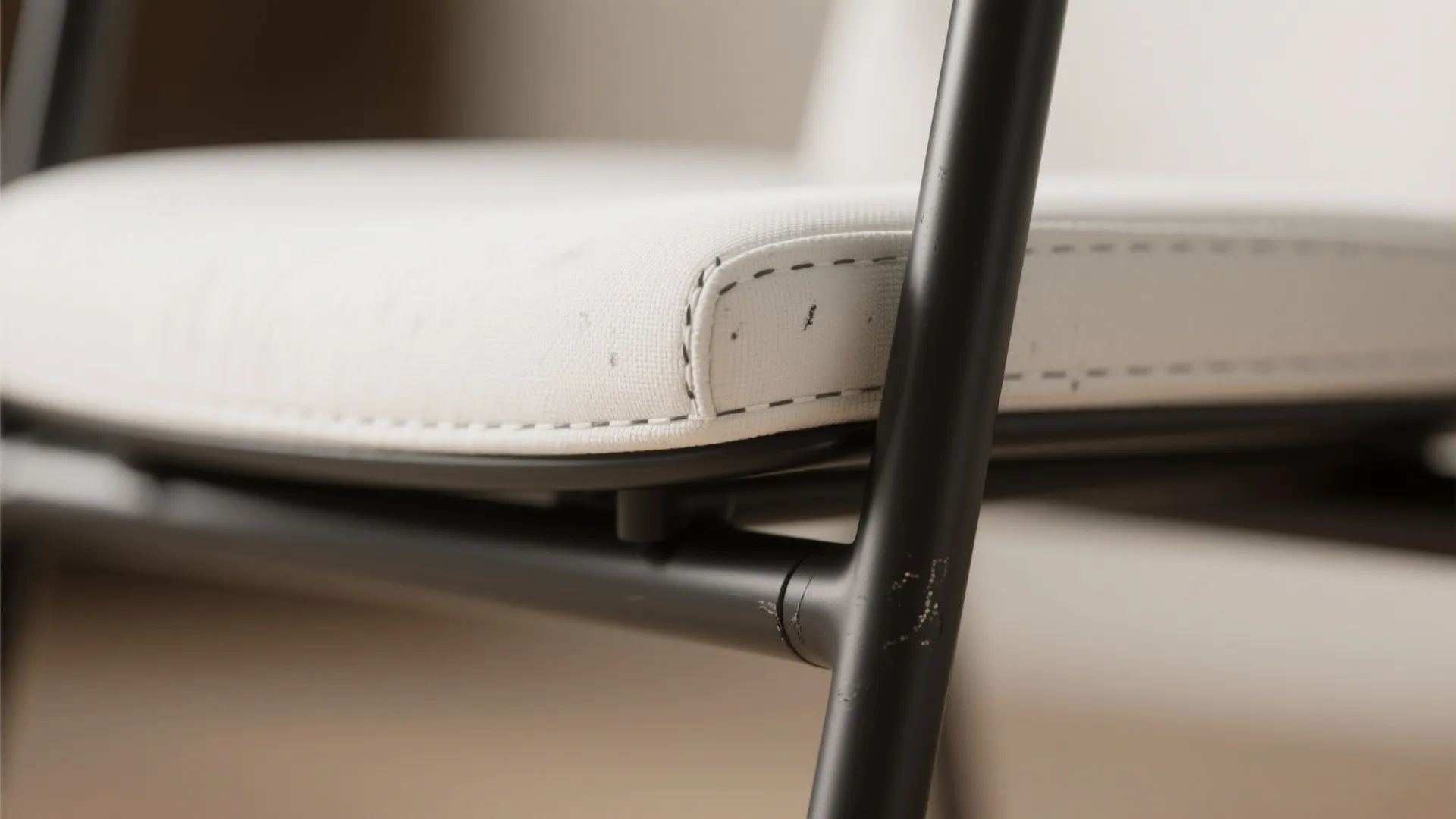 1. Mix matte black frames with white upholstery