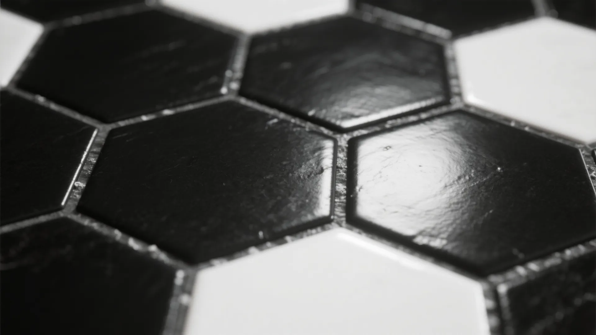 5. Mix Textures: Matte Black Tiles + Glossy White Hex
