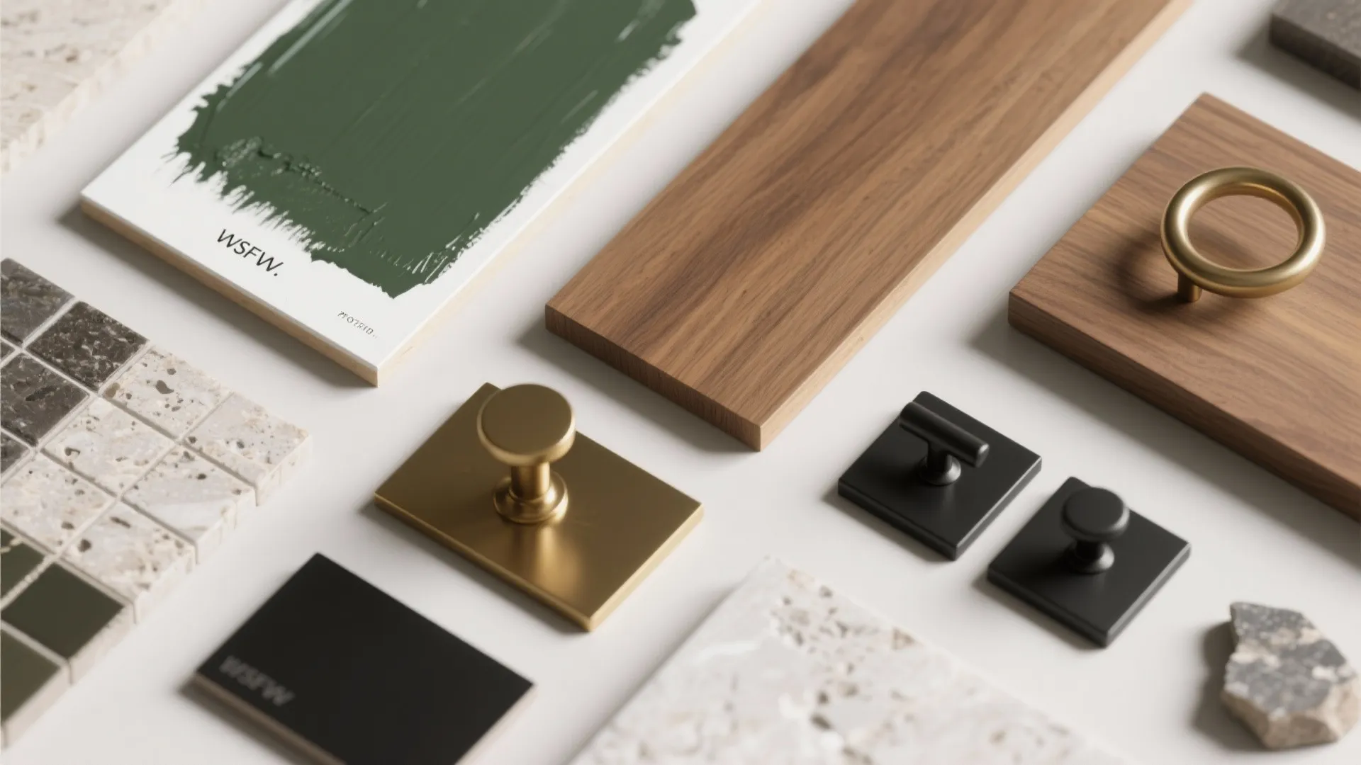 5. Matte green cabinetry with white accents and warm wood